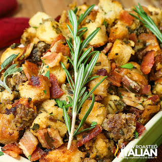 Crockpot Stuffing Recipe closeup of crockpot stuffing topped with sprig of fresh thyme