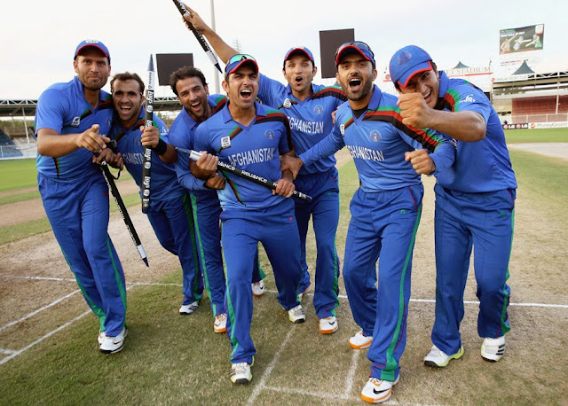The Afghanistan players celebrate their 34-run win over Kenya | Planet "M"