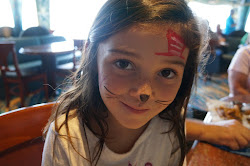 hat cat knows face painting cruising lot