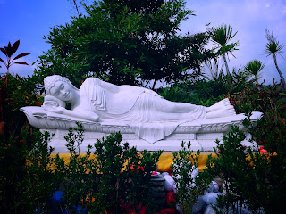 White Sleeping Buddha In The Garden Of Brahmavihara Arama Monastery North Bali