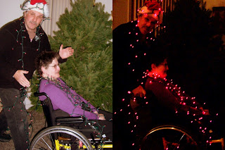 pushing wheelchair with Christmas Tree lights