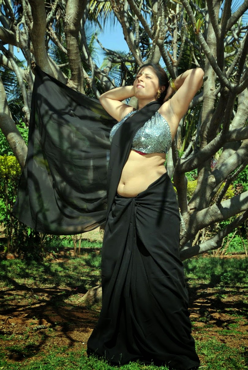 Mallu Aunty Sunakshi Hot navel and hairy armpits in black transparent saree. hq pic