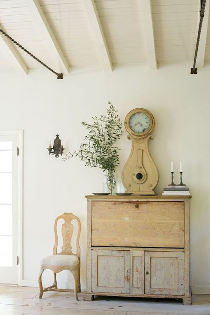 Swedish antiques in beautiful room with elegant decor - found on Hello Lovely Studio