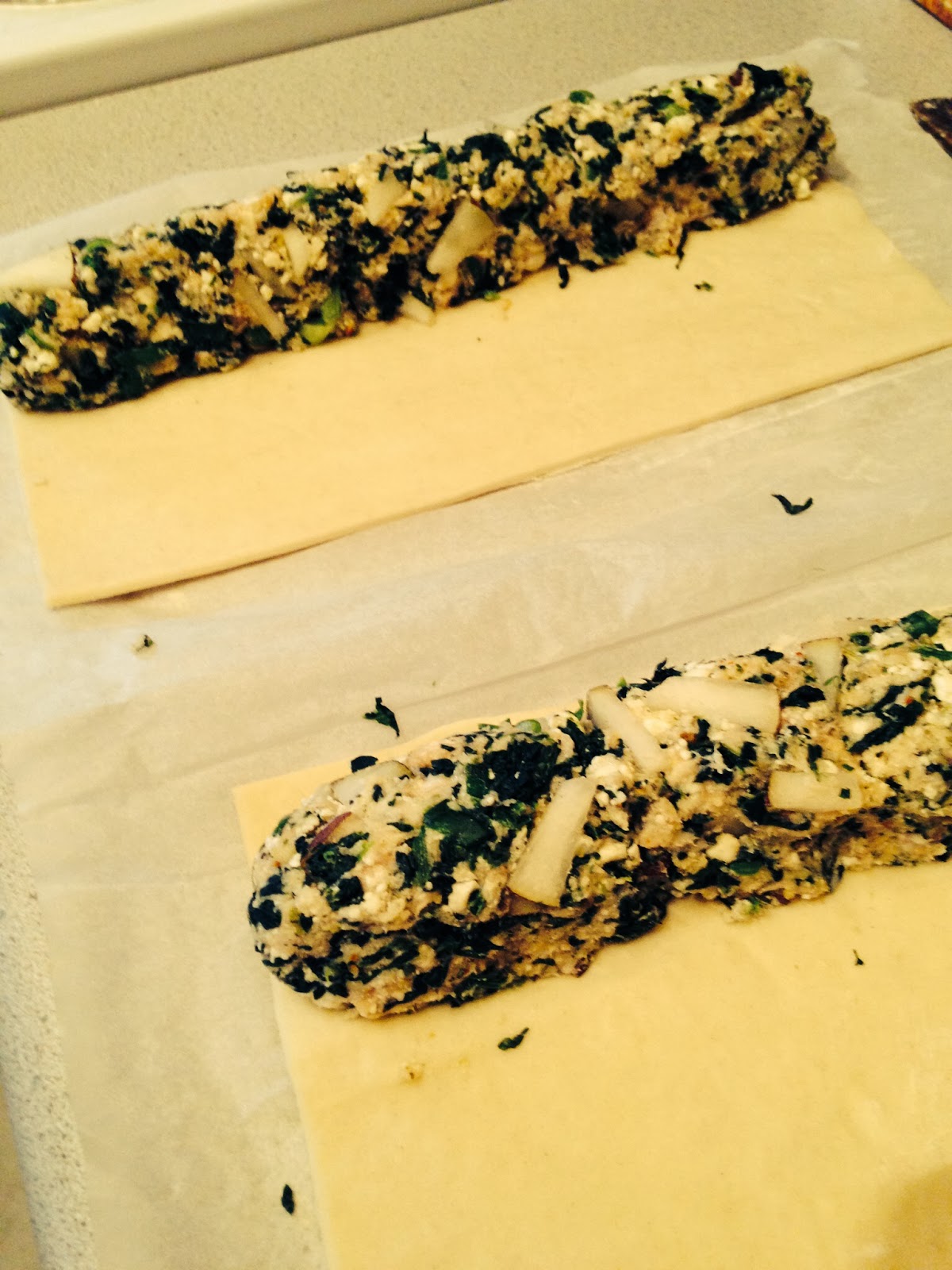 Sweet Alchemy Pork, spinach, feta and pear sausage rolls.