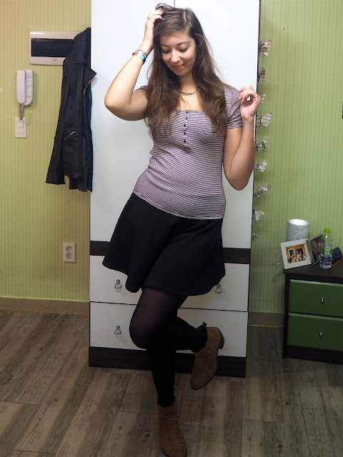 New Addition | outfit of purple and white striped t-shirt, black skater skirt and brown ankle boots