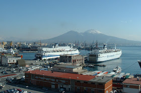 The Port of Naples, with two cruise ships dwarfing the  Palazzo dell'Immacolatella in the centre of the picture