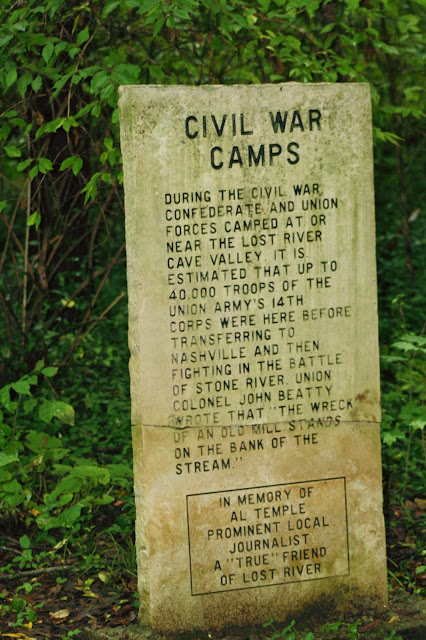 Photo of a concrete historical marker that told of the United States Civil war history of Lost River Cave