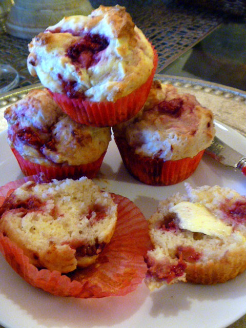 Muffins hot from the oven loaded with raspberries and moist from the sour cream makes these a special Valentine's Day muffin! - Slice of Southern
