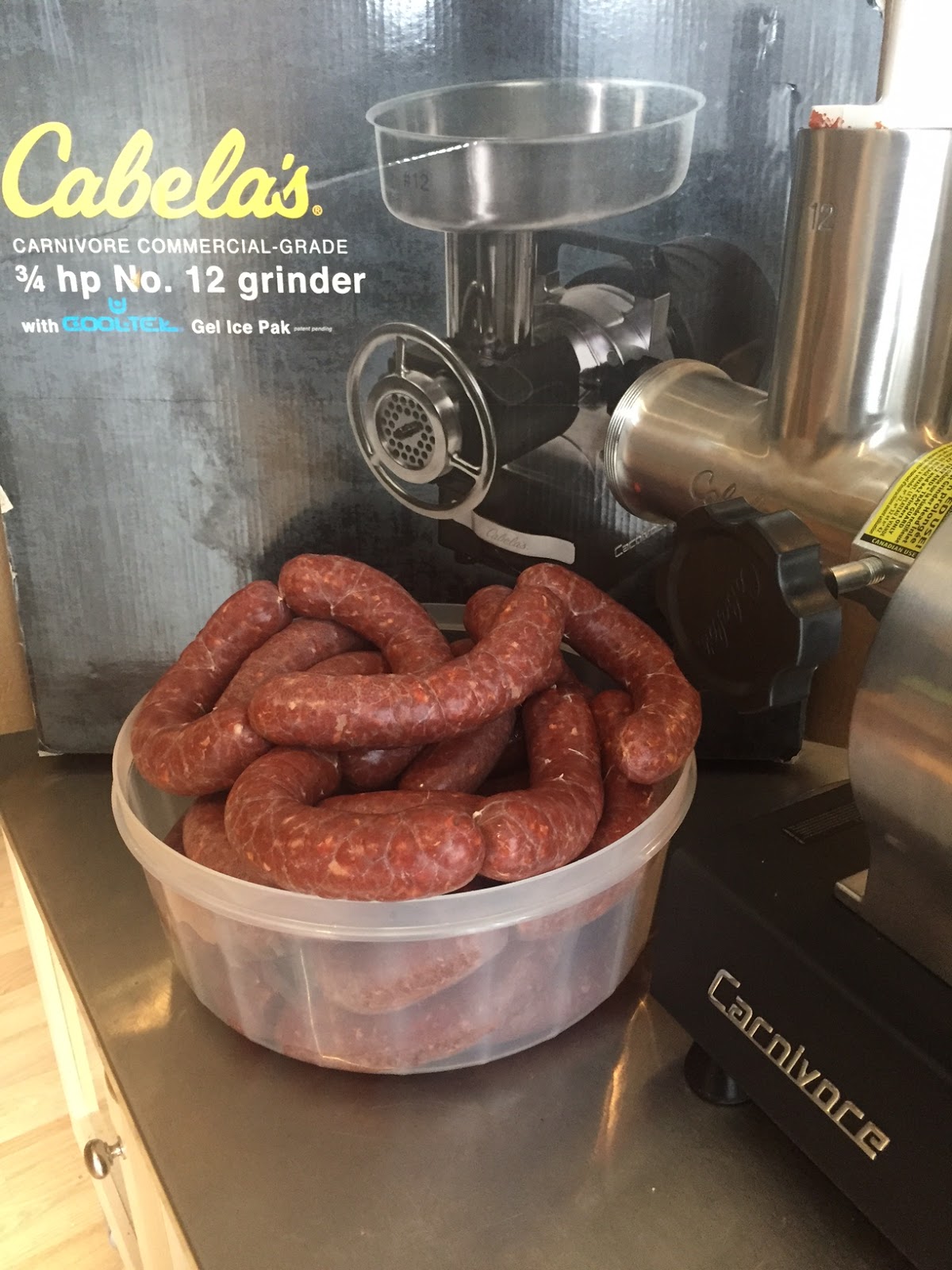 Cabela's Carnivore Meat Grinder Reel In Tag Out