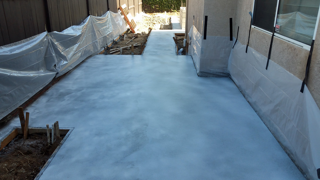 The Bell Curve of Life: Back Yard Remodel: Fresh Concrete Covered with
