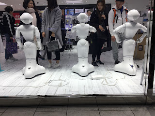 Three robots in the Softbank shop in Harajuku