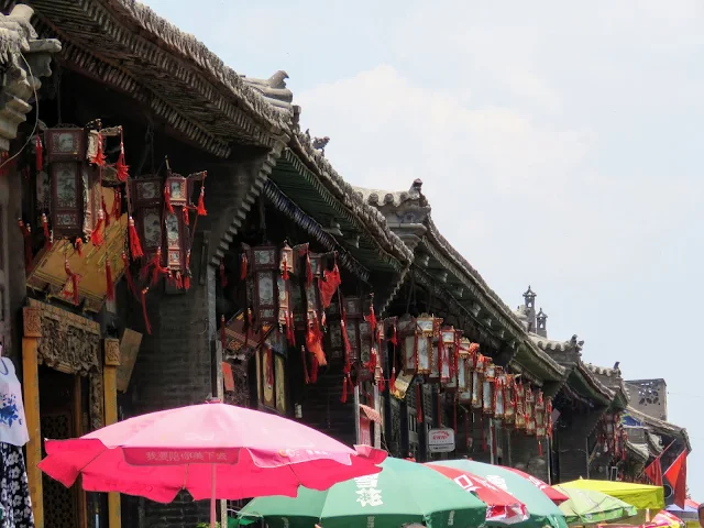 Red lanterns and umbrellas in Pingyao China