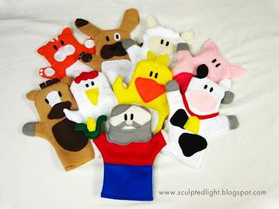 Farm animal puppets. Front view.