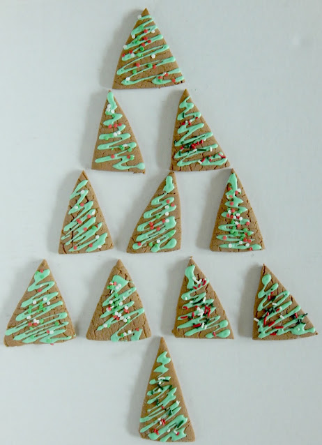 Gingerbread Tree Cookies shaped into a large Christmas Tree on a white background