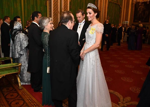 The Duchess of Cambridge wearing Lover's Knot tiara with a pale blue, fitted bespoke Jenny Packham gown