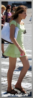 Girl in green summer mini dress