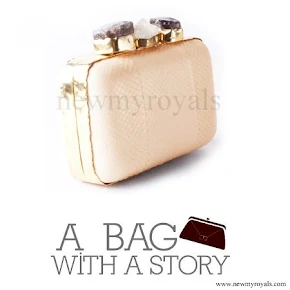 Queen Mathilde style A Bag With A Story Clutch