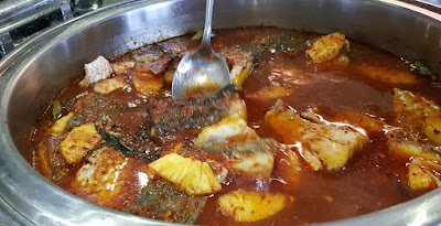 Asam pedas kakap, or seabass in spicy tamarind broth. 