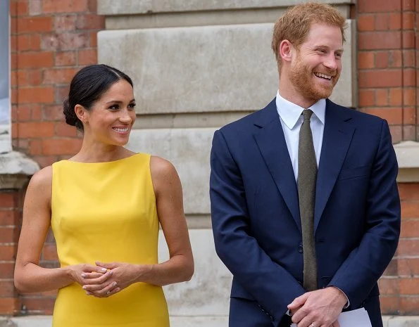 Meghan Markle wore Brandon Maxwell Yellow Crepe Midi Dress, Manolo Blahnik suede pump, Adina Reyter Diamond Amigos Curve Post Earrings