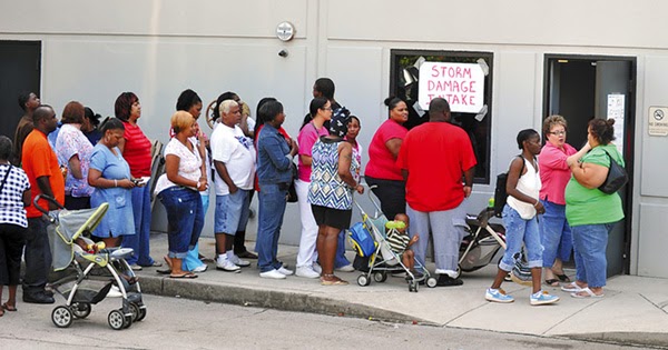 people_in_line_to_receive_food_stamps.jpg