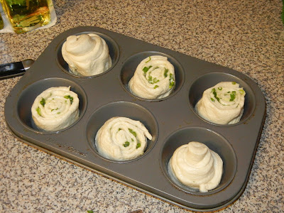 douch with Chive Garlic and Herb Rolled up in a muffin pan 