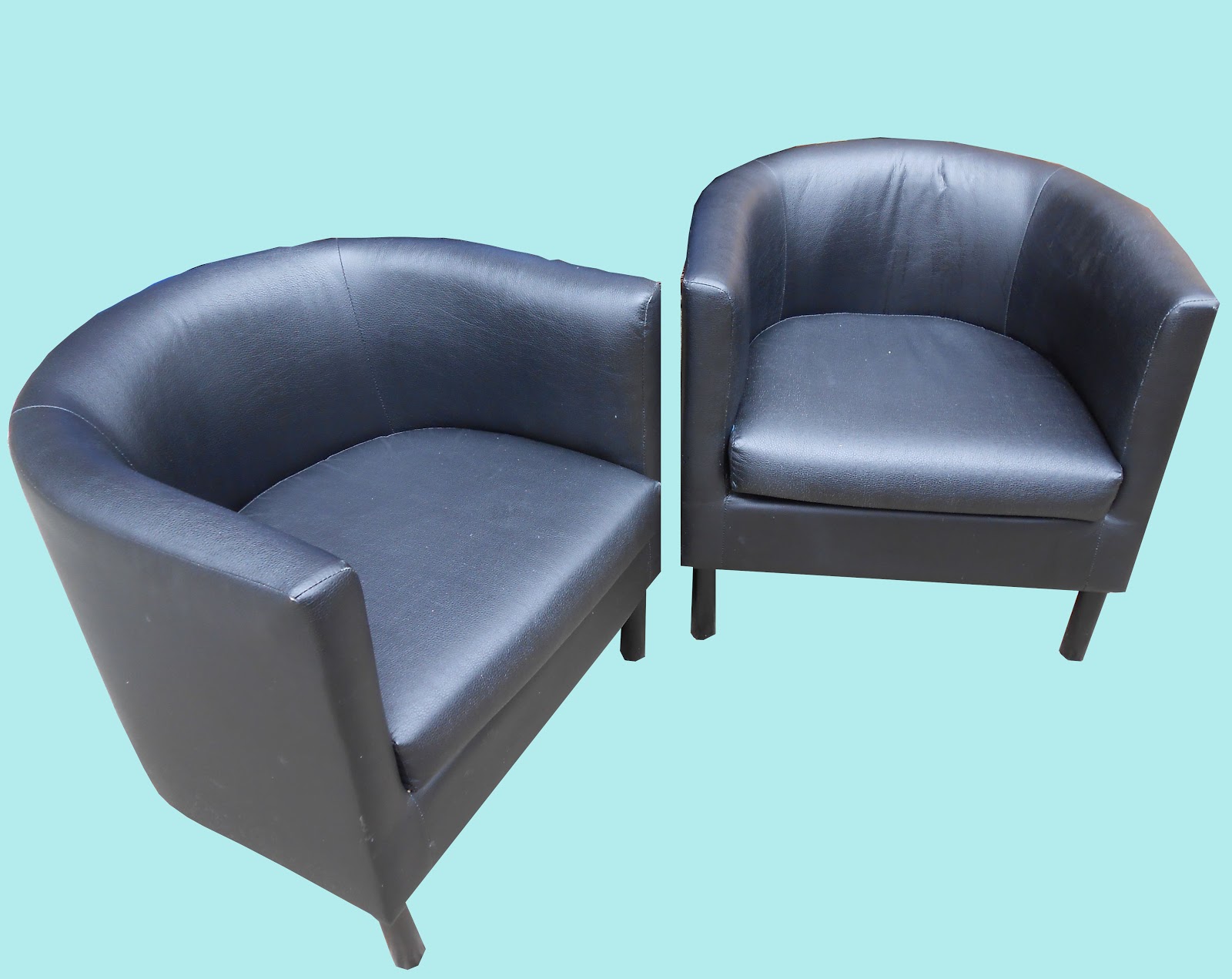 Uhuru Furniture & Collectibles Two Black "Leather" Bucket Chairs SOLD