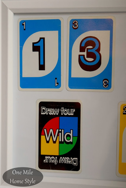 Repurpose an old UNO card game into art - One Mile Home Style