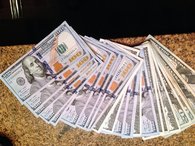 gambling bankroll cash hundred dollar bills
