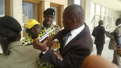 Photos: Lol... Ugandan Legislator put up for sale on OLX after he was spotted urinating on the wall of Ministry of Finance building