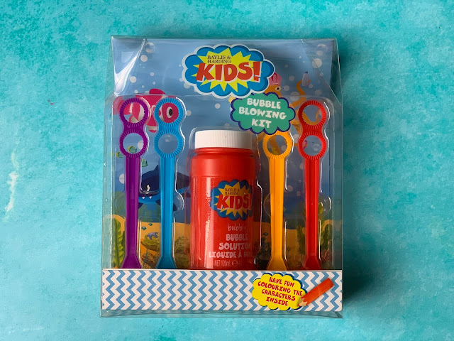 A packet with a pot of bubbles and 3 bubble wands