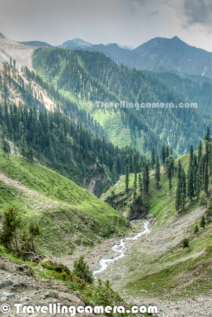 Jammu & Kashmir Tourism Department and state government are working hard to develop new tourist circuit around Old Mughal Road.  In same endeavor, they keep organizing various events around old Mughal Road which is almost complete and only few stretches are under progress.  This Photo Journey shares some of the landscapes shot around Old Mughal Road in KashmirMughal road brings the Poonch and Rajouri district closer to Srinagar in Kashmir valley. The distance between Srinagar and Poonch is reduced from 580+ kilometeres to 125 kilometers. Mughal Road makes for alternate road route to Kashmir valley from rest of India, other than over-crowded Jammu-Srinagar Highway through Jawahar Tunnel (Banihal Tunnel) (National Highway 1A). Mughal road passes through Buffliaz, Poshana, Chattapani, Peer Ki Gali, Aliabad, Zaznar, Dubjan, Heerpora and Shopian.Whole stretch of Mughal Road from Jammu to Srinagar is very beautiful. Snow capped hills all around with various white water streams flowing through them and chilled wind to keep you  fresh always. We started our Road journey from Jammu and destination for the day was Srinagar.Due to extreme whether of Jammu in summers and winters it is also known as the City of Rocks. Jammu has lots of Major tourist attractions, which includes Patnitop, Mansar Lake,Surinsar Lake, Jhajar Kotli, Baag-E-Bahu (Bahu Fort), Peer Kho, Jammu Tawi and many more...Mughal Road mainly passes through Beharamagala, Chandimarh, Dograin, Chatapani, Peer-ki-Gali, Dubjian, Shopian and Srinagar. There is a iron bridge after after Rajouri twon from where this Mughal Road starts. Whole Mughal Road is very side and amazingly beautiful which can't be expressed in photographs. Most of the photographs shared here are shot from moving car... At some spots we stopped and clicked few ones, although it was extremely difficult to resist from stopping the car after interval of every 5 minutesEvery turn on Mughal Road was coming with pleasant surprises. After Rajaouri, elevation level started increasing continuously till Peer-Ki-Gali. On the way, many times we were welcomed by clouds... Looking through these deep valleys was an amazing experience which is not possible to simulate through these photographs. One has to go to the place for experiencing the real nature and wish that place remains the same even when tourists start visiting it frequently.  Here is a view of another deep valley, which can be seen from Peer ki Gali. Peer Ki Gali is one of the most beautiful places on Mughal Road with lush green hills all around with shining white snow on the tops. Water Streams and Waterfalls flowing all around. It was very normal to see these clouds all around the Mughal Road. Kashmir is generally very beautiful and many folks visit places like Srinagar, Pehalgaon, Gulmarg etc, but Mughal Road is going to become another big tourist destination. There are few patches under progress and hope to complete soon.After high hills of Peer Ki Gali, we start driving down towards the valley which passes through Shopian. Shopian region is again very beautiful & dressed with colorful apple orchards. Houses around Shopian were amazing - mainly two storied buildings with slanting roofs & some of them plastered with mud paste. Wood is heavily used in Kashmiri houses...Mughal road was historically used by Mughal emperors to travel and conquer Kashmir during the sixteenth century. Old Mughal Road was the route used by Akbar the Great to conquer Kashmir in 1586, and his son Emperor Jahangir died while returning from Kashmir on this road near Rajouri.Mughal Road is the road between Bafliaz, which is a town in the Poonch district, to Shopian district in the Kashmir valley. The road is 84km long and situated in the Jammu and Kashmir state of India. Mughal Road passes over Pir Panjal Mountain range, at altitude of 11500 feets that is higher than Banihal pass..Here is a photograph of Paddy fields in Rajouri District of Jammu & Kashmir state in India. Rice of this region is quite popular in different parts of the country. Most of the agricultural land was occupied by green paddy. I find all Kashmiri names interesting - Pulwama, Pampore, Kulgam, Bijbehara, Anantnag etc... Wheat is the main staple food with significant proportion of people associated with rice. Jammu is nationally and internationally famous for its Rajma Chawal which is Red Kidney Beans and Rice. But after the migration of Kashmiri Pandits in 1987, Rice is also getting famous around the area. basmati Rice of Jammu is exported to many foreign countries and is known for its distinct taste and smell.After wonderful drive through Mughal Road, we reached Srinagar Golf Course which is near to Nageen Lake of the town, Above photograph shows Golf Club building and opposite to it was Golf Course. Kashmir, which is also known as heaven on earth, offers a unique opportunity to play golf in wonderful surroundings, where the wind whispers through enormous trees of chinar and stately pine. There are various popular places in Kashmir to Golf & Gulmarg one is one of the most popular in the country.   In the verdant golf courses at Srinagar and Gulmarg, it's easy to play for longer hours than you can in the plains because of the lower temperatures – Srinagar’s highest temperature seldom goes above 35°C. During the summers, while the plains are boiling, Srinagar's temperate climate allows the golfer to play longer hours without getting tired. During winters, the courses in Srinagar are closed only when snowbound. Above Golf Course is very well placed inside the town.Again a photograph of Srinagar Golf Course with green hills in the background and dense clouds roaming all around..Kashmir has been rightly called paradise for Nature lovers & Travellers with a network of rivers and streams as well as high altitude lakes all abounding in trout both brown and rainbow.Trout fishing in Kashmir is one of the most popular activity and quite known in various parts of the world. Department of Fisheries, which controls angling in the valley,works hard to ensure that there is no depletion of stock by indiscriminate fishing which means that you can revel in angling in ideal conditions. Various tourists and localities can be seen around Dal Lake doing fishing.