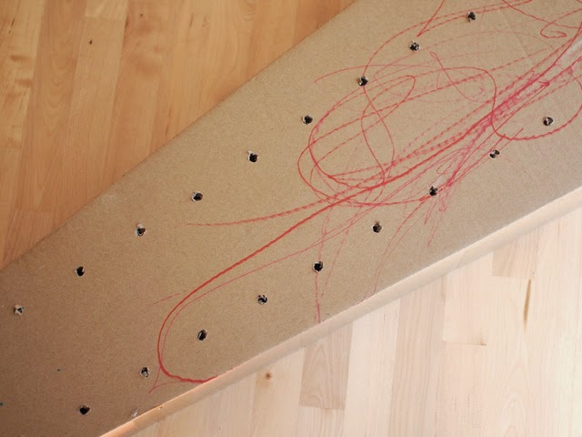 Drill holes to make your own cardboard runway