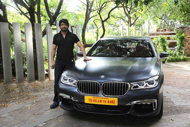 Akkineni Nagarjuna,Akhil pose with New BMW Car Akkineni Nagarjuna,Akhil pose with New BMW Car