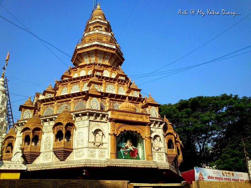 Lord Shiva and Parvati on the building of Shreemant Dagduseth Halwai Ganpati Temple, Pune - India