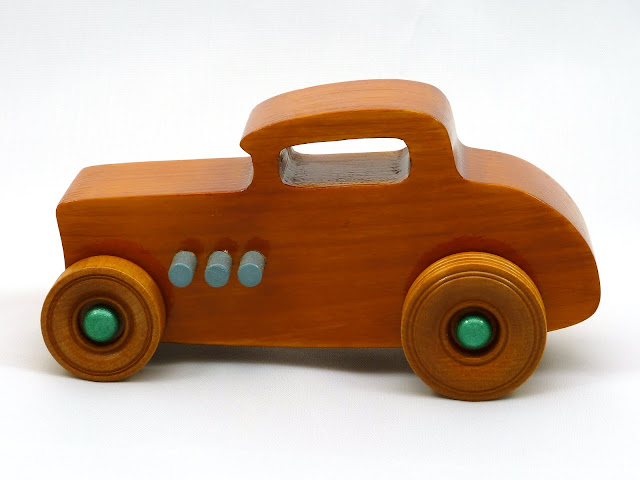 Left Side - Wooden Toy Car - Hot Rod Freaky Ford - 32 Deuce Coupe - Pine - Amber Shellac - Metallic Green - Gray Left Side - Wooden Toy Car - Hot Rod Freaky Ford - 32 Deuce Coupe - Pine - Amber Shellac - Metallic Green - Gray