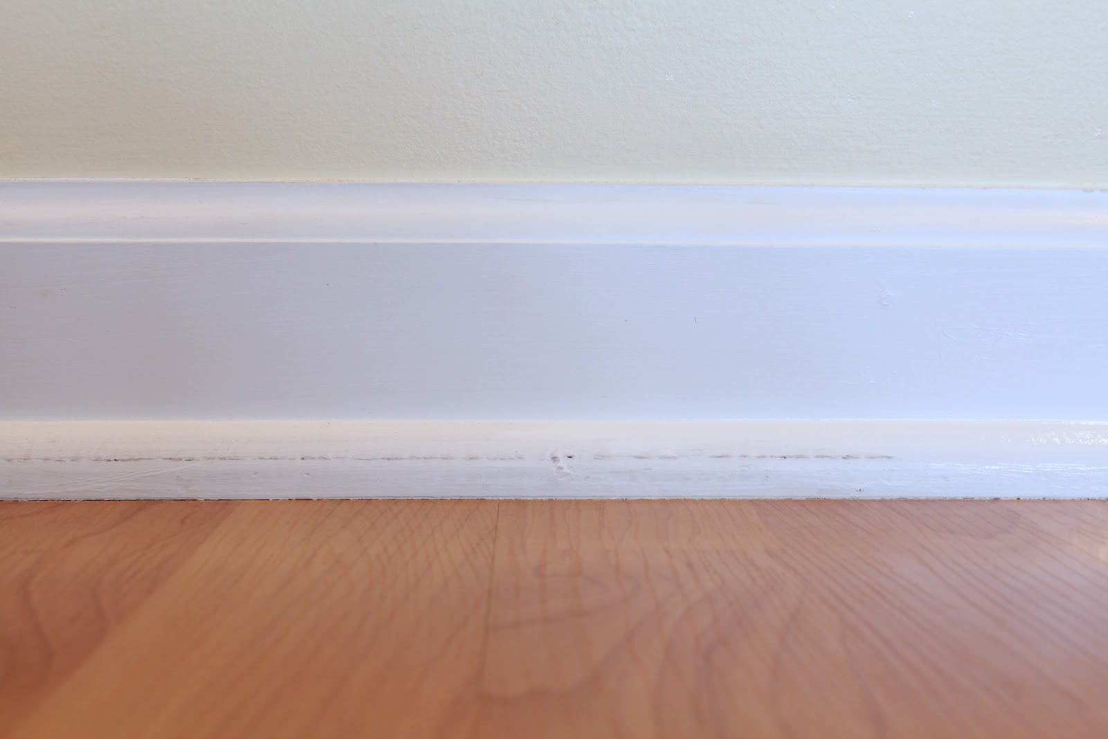 Nearly Handmade Spring Cleaning Touching Up Baseboards