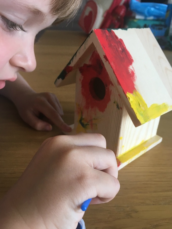 BoxWild-Children's-Big-Bird-Gift-Box-Review-boy-adding-more-colours-to-the-bird-box
