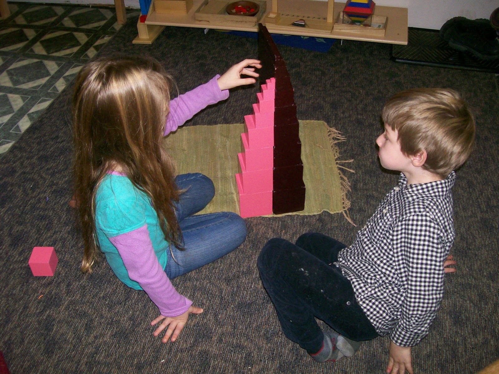 Tree House Preschool Daycare Peanut showed Iish some pink tower, brown