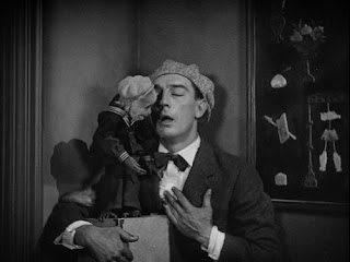 Buster Keaton with a monkey in The Cameraman