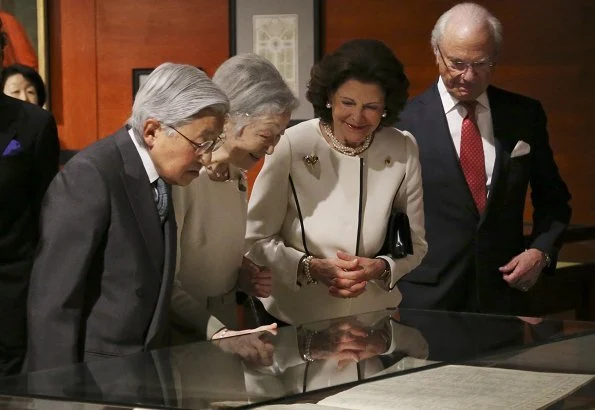 King Carl Gustaf, Queen Silvia of Sweden, Japan's Emperor Akihito and Empress Michiko visited Art of Natural Science exhibition at JP Tower Museum