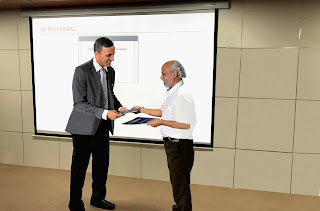 Mr.S.Varadarajan, Director of Wabag exchanges MoU with Dr.Vinod tare of IIT
