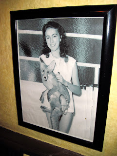 A photo of a young Elayne Bruno, owner of the Old New York restaurant Chez Napoleon