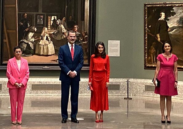 Queen Letizia wore Massimo Dutti limited edition draped silk dress. Magrit red pumps, carries Carolina Herrera clutch. Coolook Nereida earrings