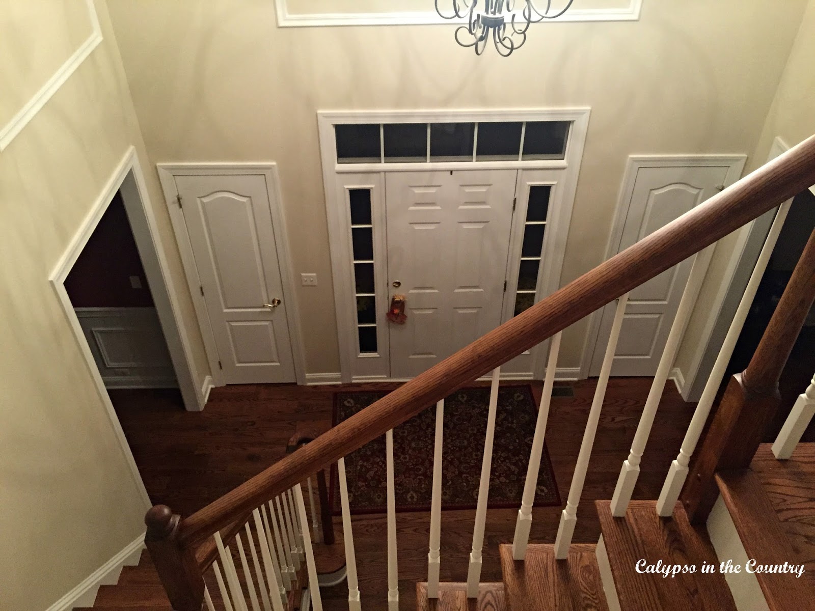 Foyer painted Benjamin Moore White Sand