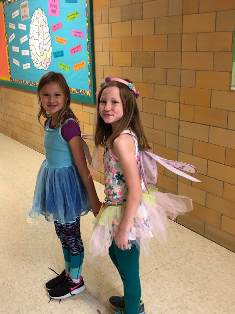 two kids dressed up as fairies