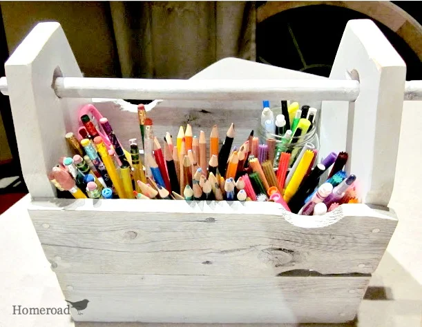 crate filled with school supplies