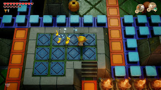 Link playing the Ocarina in the middle of the first floor of the Eagle's Tower. He's on an elevated area surrounded by crystal blocks.