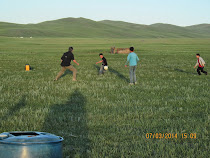 Playing soccer on the Mongolian steppes with Nypbda, Esenjan, Esenbek, and Nurlan at the homestead