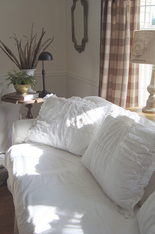 The Essence of Home Fluffing the Pillows