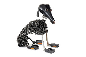 11-Sit-Nirit-Levav-Recycled-Bicycle-Parts-used-for-Unchained-Dog-Sculptures-www-designstack-co
